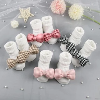 Đôi vớ cotton họa tiết caro đính nơ dễ thương dành cho bé