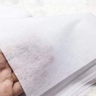 Keo hạt ủi nhiệt trắng khổ 1m2 và 1 mét đen giấy hột dùng ép nẹp cố định áo