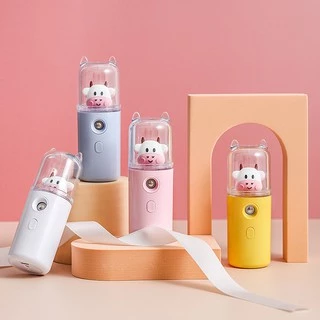 Máy phun sương mini cầm tay hình chú bò sữa