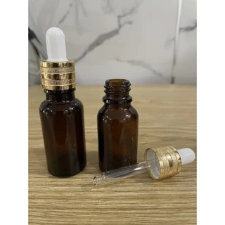 Chai thủy tinh 20ml nâu nắp bóp khoen vàng kiểu đẹp