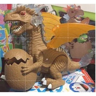 Hộp đồ chơi khủng long dinosaur canh trứng di chuyển đèn nhạc
