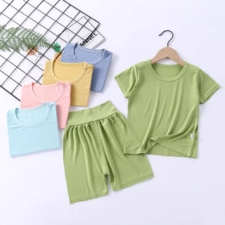 Set áo tay ngắn + quần ngắn lưng cao bằng vải cotton mỏng thoáng khí màu trơn thời trang mùa hè mặc nhà cho trẻ em