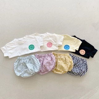 Bộ đồ 2 món áo tay ngắn và quần đùi vải cotton hoạ tiết mặt cười dễ thương thời trang mùa hè phong cách Hàn Quốc cho trẻ