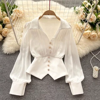 Design niche wrinkled V-collar long-sleeved shirt female French temperament irregular hem bubble sleeve chic blouse