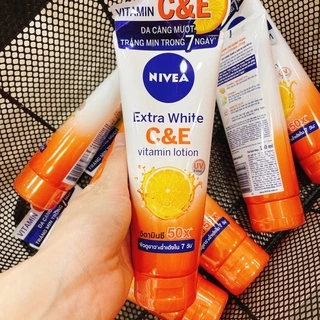 Sữa dưỡng thể Nivea dưỡng trắng căng mượt da trong 7 ngày Extra White C&E 180ml