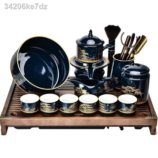 ∋♕❁Bộ ấm trà Kung Fu bán tự động gốm sứ gia dụng Ji chén trà men xanh Khay trà gỗ nguyên khối cao cấp Trung Quốc