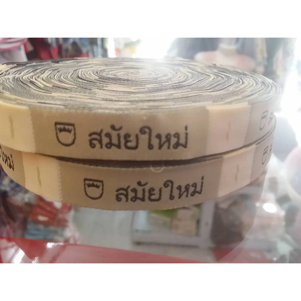 Mác quần áo chữ Thái.
