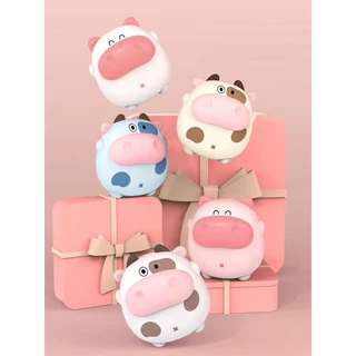 Máy sưởi mini cầm tay, sạc dự phòng 2 trong 1 hình bò sữa siêu cute, có đèn