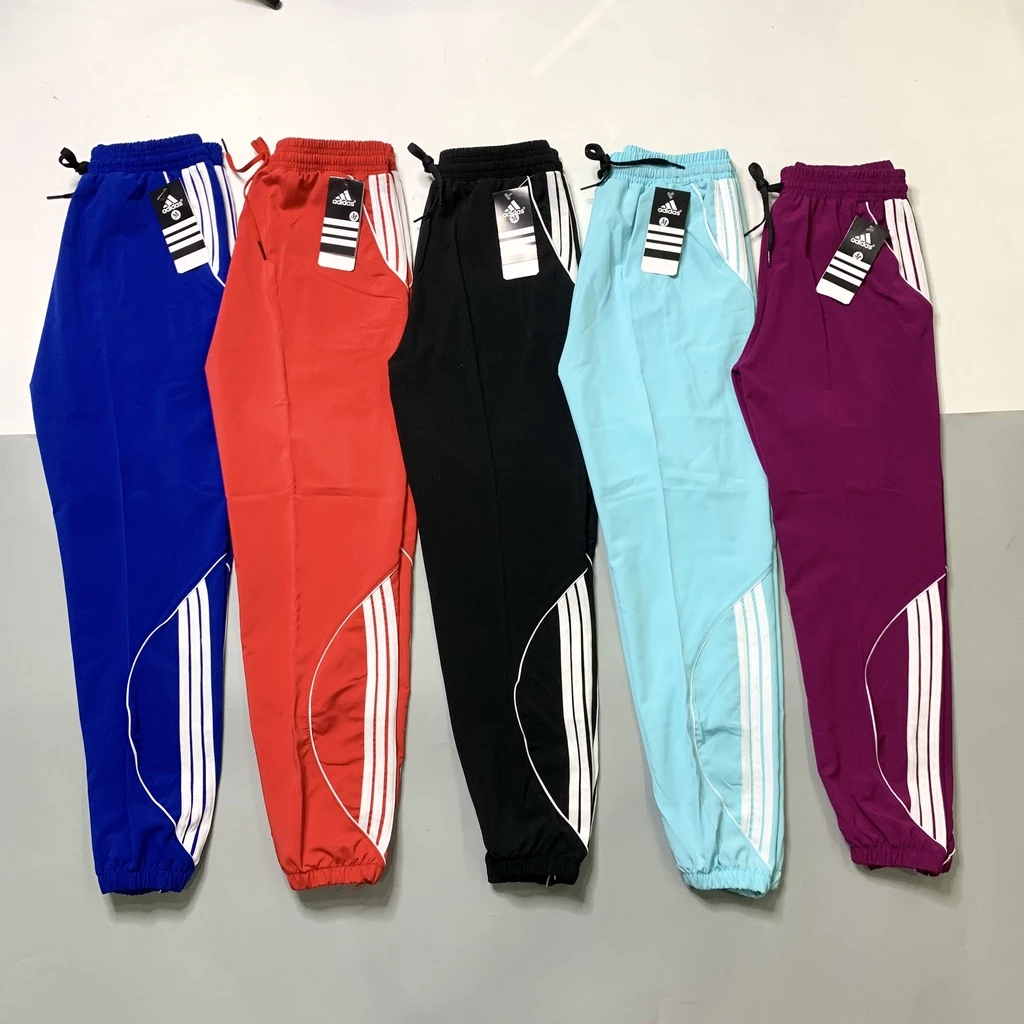 Quần Jogger Thể Thao Nữ 3 Sọc Viền Lượn Vải Dù Co Dãn Nhẹ Tập Gym