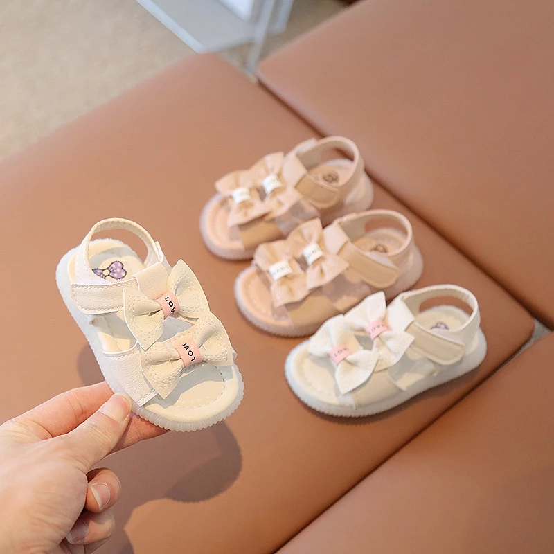 Sandal Rọ tập đi đính nơ Love chống vấp ôm chân cho bé gái Size 16-20