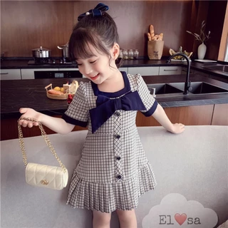 Váy Caro Đen Xòe Đuôi Cá Nơ Ngực Xinh Xắn Dành Cho Bé Gái 8-25kg