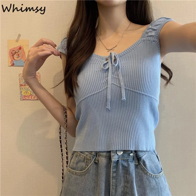 Whimsy Mùa hè thiết kế mới niche màu trơn thon gọn bên trong đáy không tay áo vest dệt kim ngắn dành cho nữ