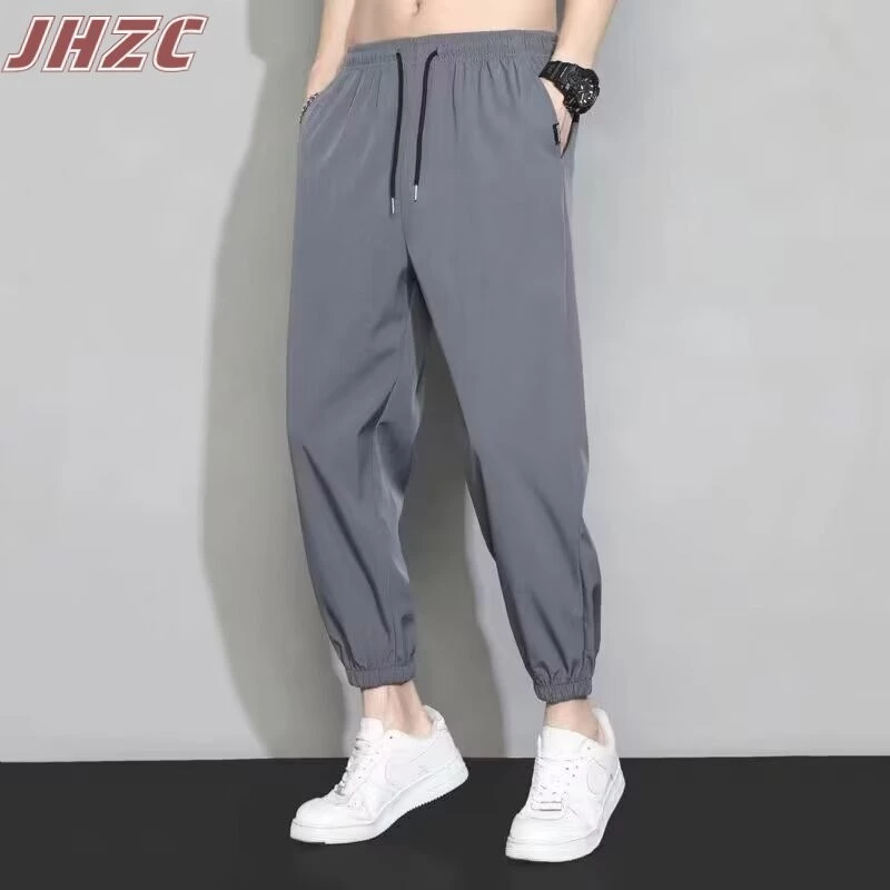 Quần nam JHZC, xuân thu thời trang Hàn Quốc đơn giản màu trơn hợp thời trang lụa băng khô nhanh quần rộng thoải mái
