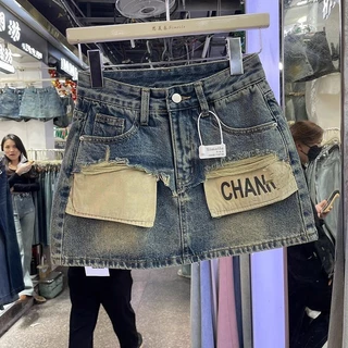 Mùa Hè 2024 Chống chói Ôm Hơn Nhìn Cao Cấp Cô Gái Nóng Váy Chữ A Retro Túi Váy Denim Nữ