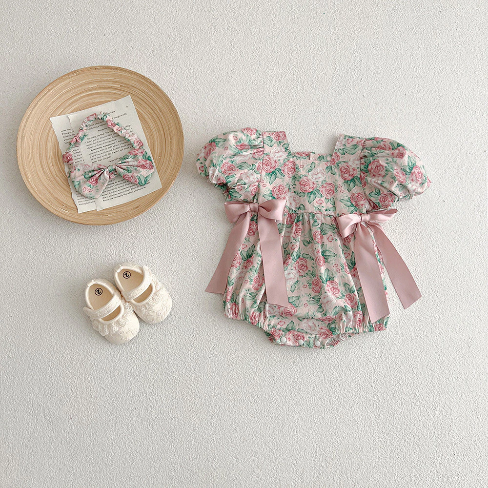 Ig Bán Hot Áo Liền Quần Sơ Sinh Họa Tiết Hoa Hồng Dễ Thương Cho Bé Gái Jumpsuit Phiên Bản Hàn Quốc Nơ Trang Trí Áo Liền Quần Tay Ngắn + Băng Đô Bé Gái Body Quần Áo Cho Bé 0-2 Tuổi