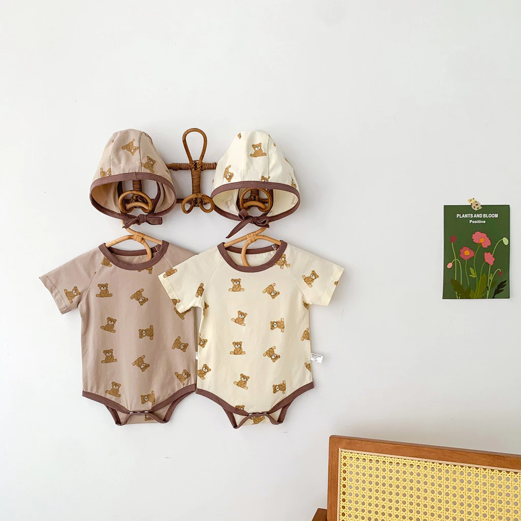 Ins Spring Bộ đồ liền thân bé trai sơ sinh dễ thương 2 màu họa tiết gấu bông bé trai Áo liền quần ngắn tay + mũ Bộ 2 món Quần áo trẻ em bé trai 0-2 tuổi