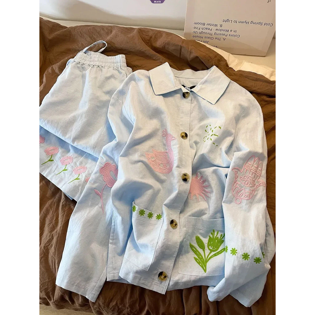 Đồ ngủ nữ họa tiết hoạt hình đơn giản, bao gồm cardigan và quần dài, phù hợp mùa xuân - thu.