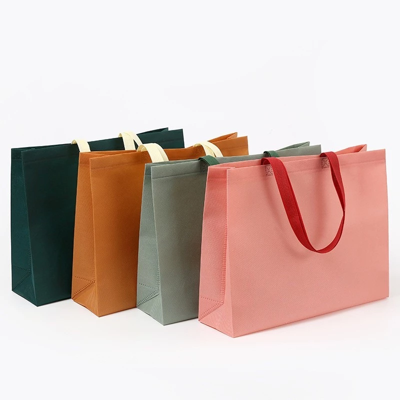 Túi vải không dệt kích thước 25x35x10 cm có quai vải.