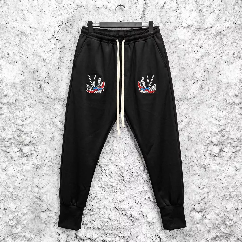 Quần Jogger Trơn Thêu Hình Chim Én , Chất Co Dãn Nam Nữ