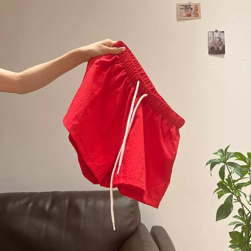 Quần short nữ thể thao mùa hè co giãn cổ điển dây rút ống rộng Quần short thông thường