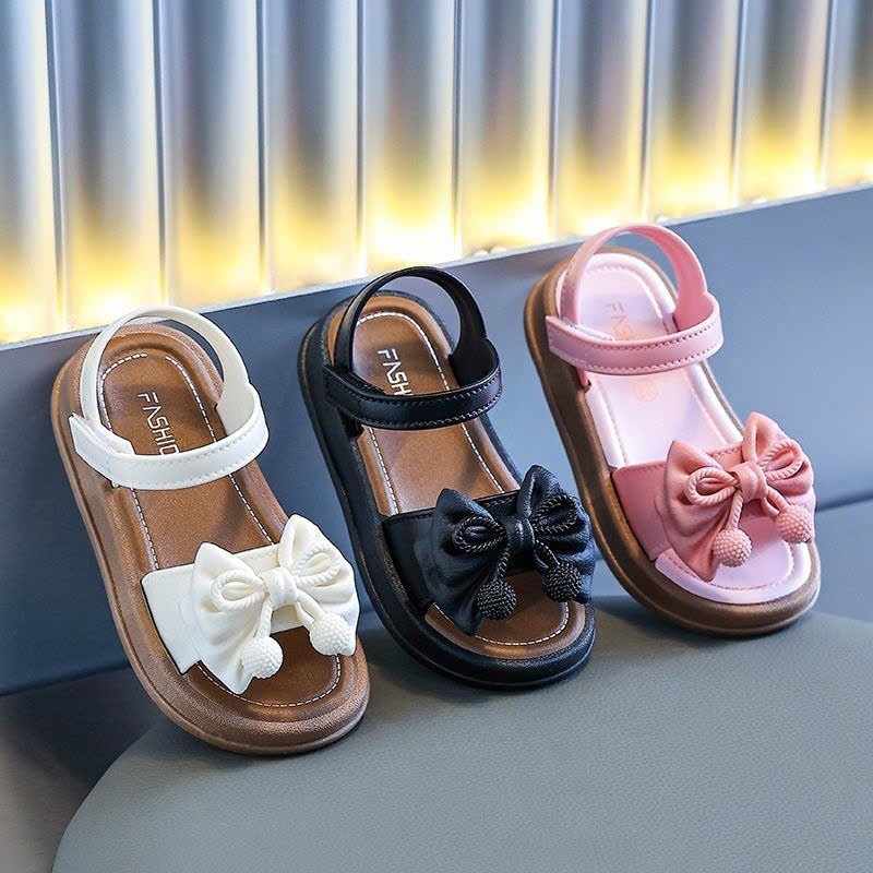 Dép Sandal Bé Gái Đính Nơ Cục Bông Siêu Xinh Hot Trend 2026 - Êm Chân, Quai Dán Dễ Mang, Size 21-35 Cho Bé 3-9 Tuổi