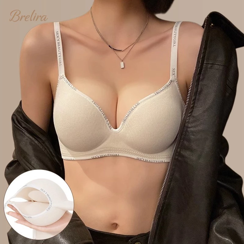 Áo ngực không đường may, dáng tròn, không để lại vết hằn, đường may thẳng hàng, chất liệu mềm mại và thoải mái, màu trắng sữa, tôn dáng vòng một đầy đặn, thích hợp mặc hàng ngày cho nữ. Chất liệu thân thiện với da.