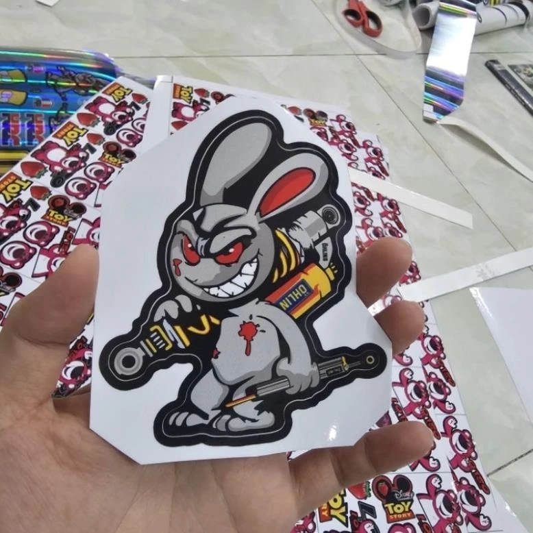 Tem sticker thỏ điên cầm phuộc