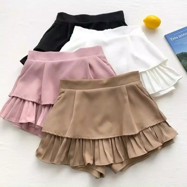 Chân váy xếp li 2 tầng có túi có quần trong chất tuyết mưa rất dễ phối đồ siêu xinh luôn Hàng QC