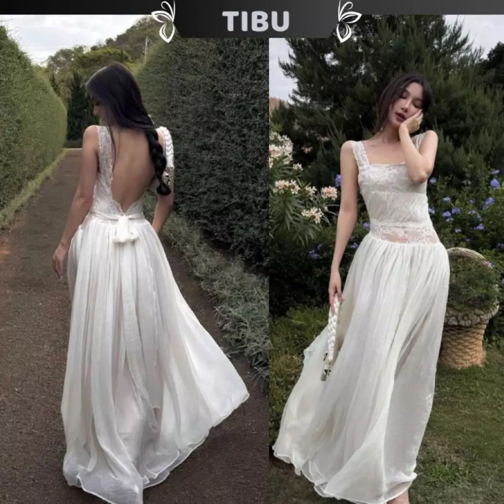 YABUMA - Đầm Maxi Hai Dây Hở Lưng Cột Nơ Dáng Xoè Tiểu Thư Sang Chảnh Phối Ren Đi Chơi Dạo Phố D711