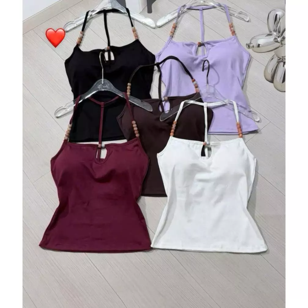 Áo kiểu 2 dây hạt dây đứng sau , khoét giữa có mút cực xinh , chất thun bozip mềm mịn YBM