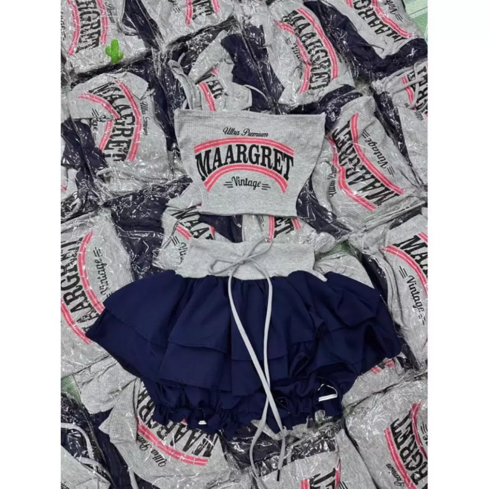 Sét bộ áo ống croptop in chữ kiểu marrget phối chân váy xòe có quần trong bo chun xinh xinh YBM
