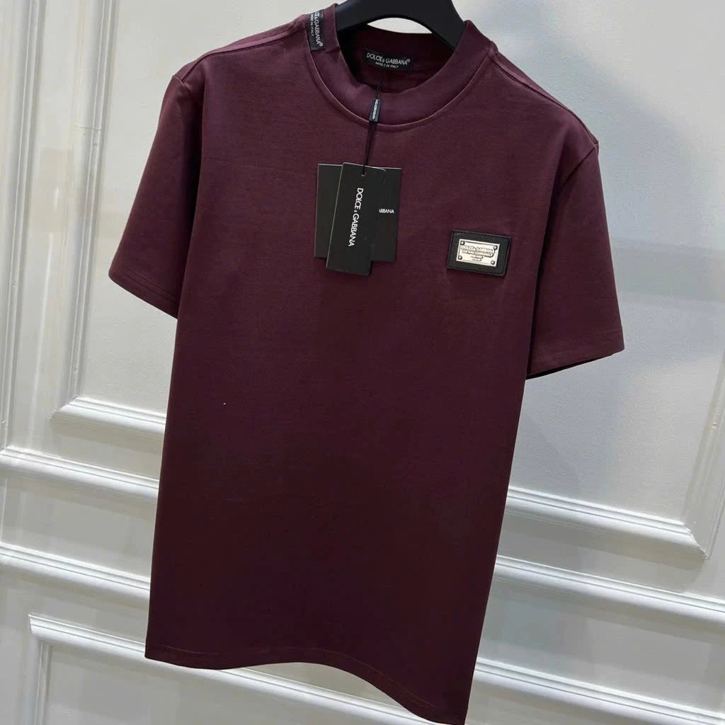 Áo phông nam nữ Premium Cotton trơn phối thêu logo Đôn Chề da tag sắt khắc chữ phối mác viền cổ Hot Trend 2026