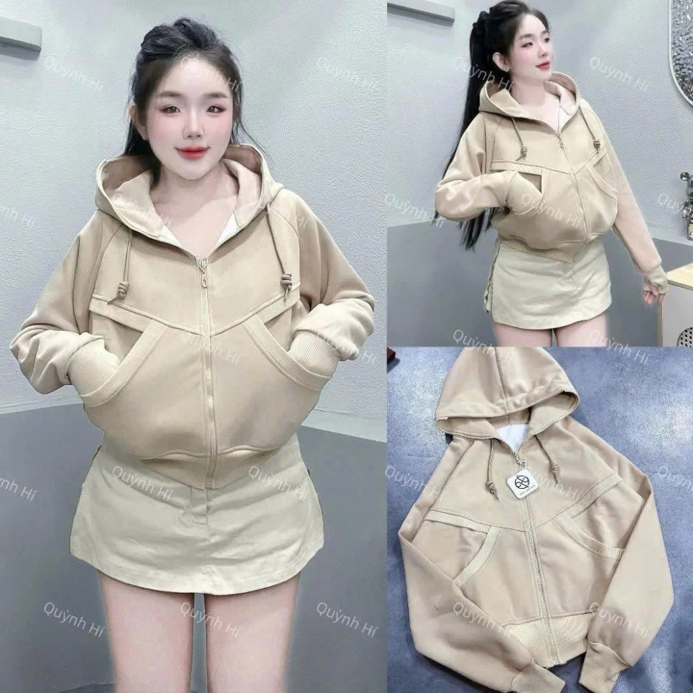 Áo hoodie nữ kiểu boxy với túi chéo, thiết kế croptop tôn dáng và chất liệu nỉ mềm mại, dày dạn.