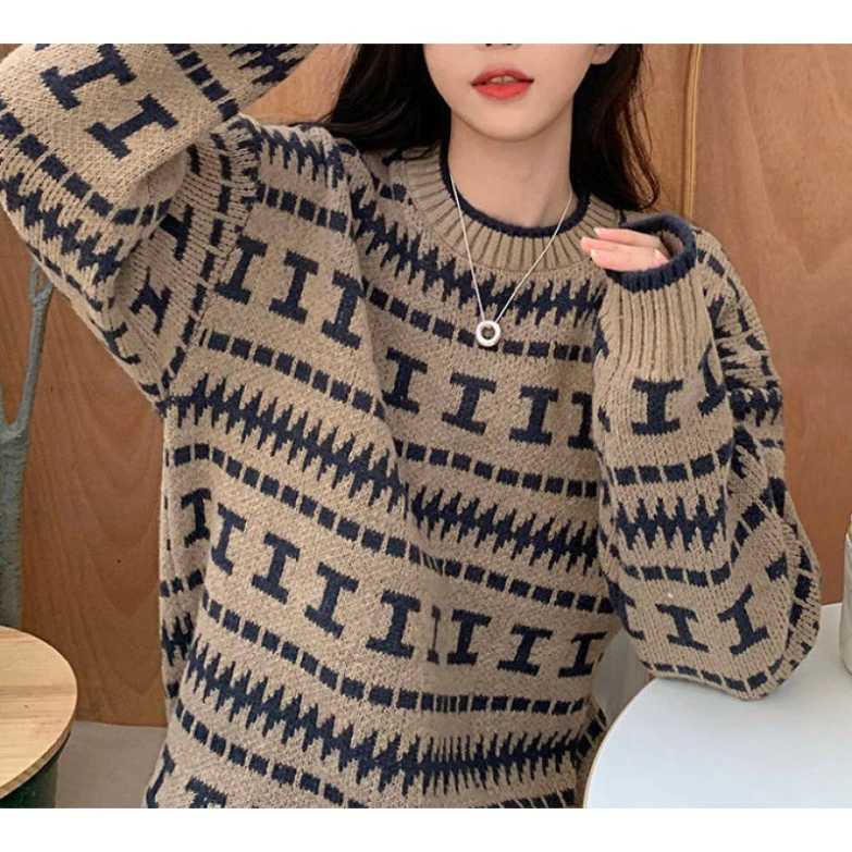 Áo len dày dặn họa tiết thổ cẩm phong cách Hadu shop - sự lựa chọn hoàn hảo cho mùa đông.