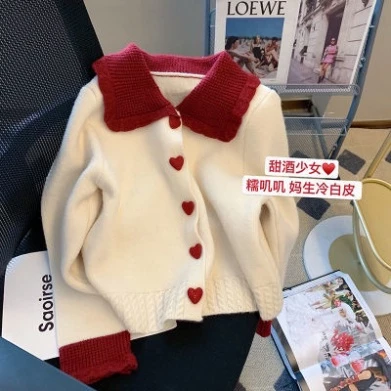 Áo cardigan len dày phối màu, kiểu dáng ngắn mềm mại từ Hadu Shop, hoàn hảo cho phong cách thời trang hiện đại.