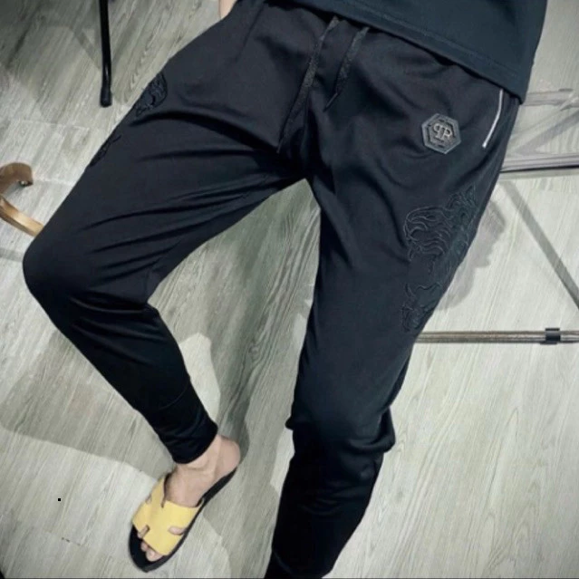 Quần Jogger qp hịa tiết hỏi thêu chất umi đang thể thao dành cho nam hot hit Hot 2026 QC  2025