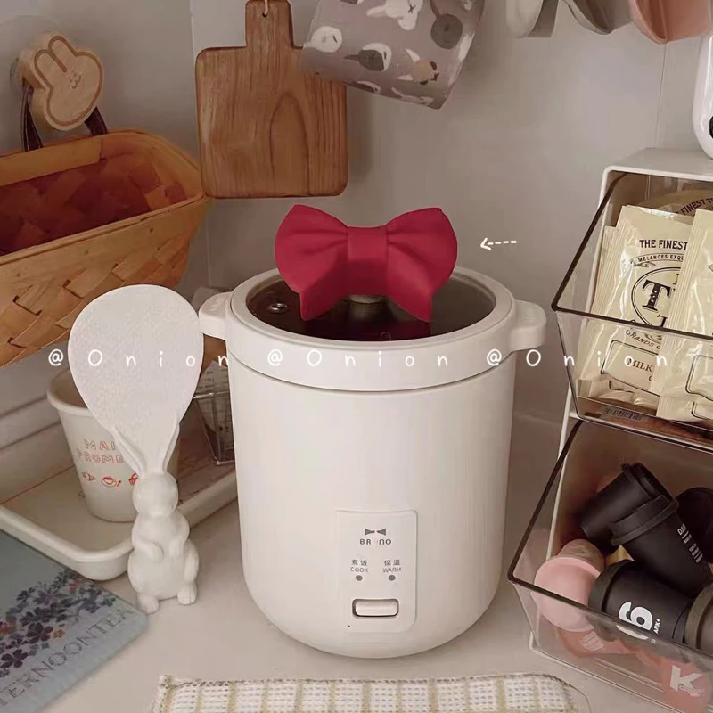Miếng lót tay bắc nồi hình nơ silicon cute