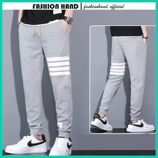 Quần jogger thể thao nam unisex chất xốp kẻ viền ngang bo gấu phong cách trẻ trung cá tính - Fashion Hand