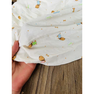 vải thun cotton pc 2c hoạ tiết cún kute nền kem