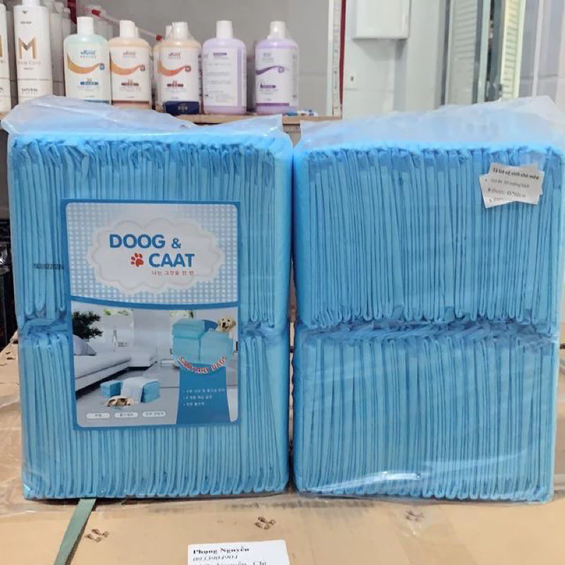 (GIAO HÀNG HỎA TỐC) - Tã lót cho chó mèo đi vệ sinh vào khay, chuồng bằng giấy siêu thấm hút 50, 100 tấm miếng