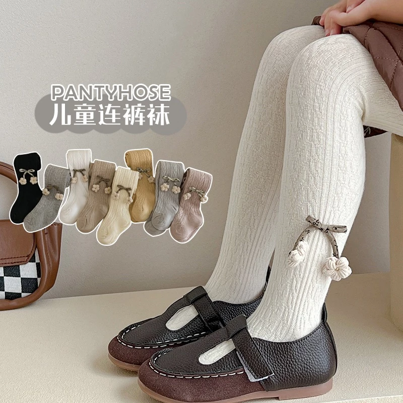 Quần tất len gân liền bàn cho bé co dãn liền có đính nơ hàng Quảng Châu cao cấp cho bé từ 1 - 10 tuổi