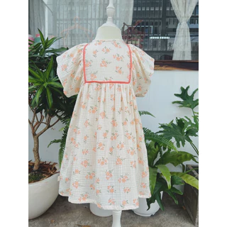 Đầm nhún tay hoa nhí cam xô muslin Tây babycloset cho bé gái