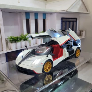 Mô hình xe thần gió Pagani Huayra tỉ lệ 1:24 có còi, có đánh lái và chạy cót