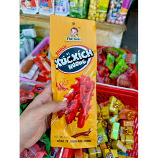 Bim bim, que cay, snack xúc xích nướng