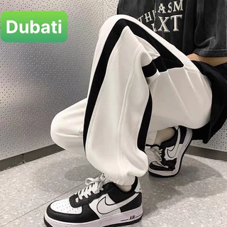 QUẦN JOGGER NAM NỮ UNISEX CHẤT NỈ DÀY DA CÁ ỐNG SUÔNG RỘNG SỌC CHÉO RÚT DÂY HOT TREND 2024 -DUBATI FASHION