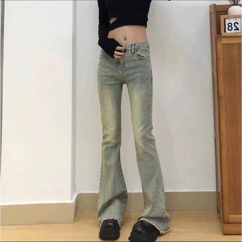 Quần jeans co giãn ống loe gấu tua dáng dài lưng cao