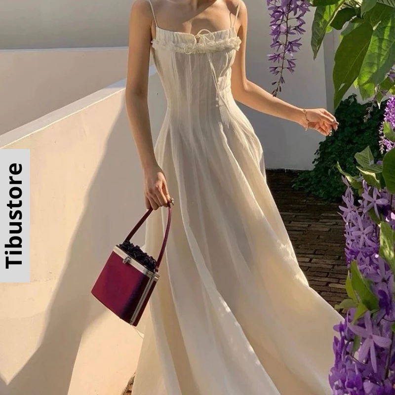 Đầm Maxi Hai Dây Bèo Ngực Dáng Xoè TIBU Đầm Nữ Hở Lưng Thắt nơ Trắng Chiết Eo Tôn Dáng Sang Chảnh Đi Chơi Biển Dự Tiệc