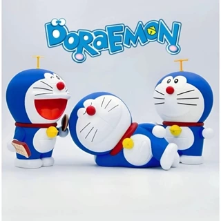 Mô hình Doraemon có khớp nằm ngủ / cầm bánh rán 23cm ( hàng có hộp xinh xắn )