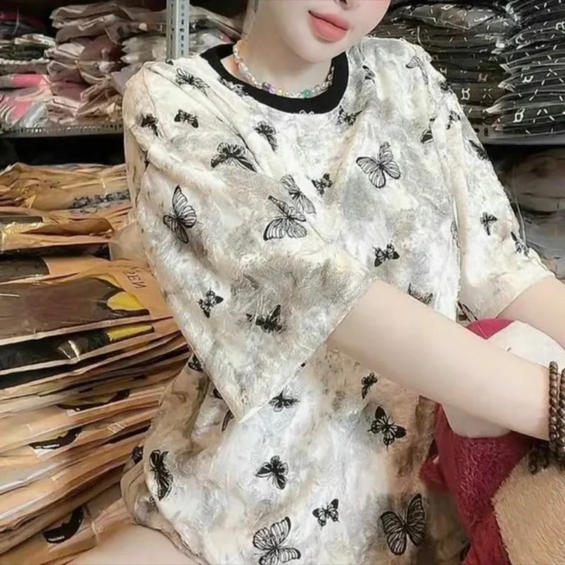 Ao phông rộng xước rách cotton hình buom in full
