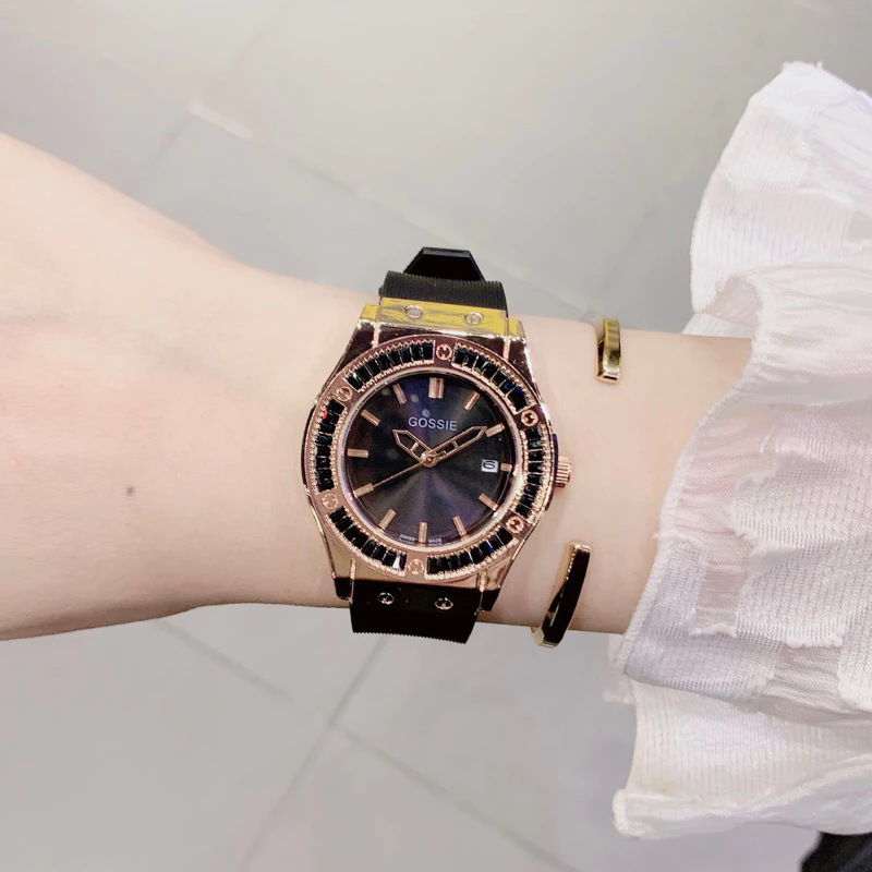 Đồng Hồ Nữ Gossie Đen Đá Ống Ruby Cao Cấp Sang Trọng